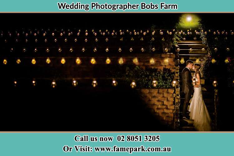 Photo of the Groom and the Bride kissing Bobs Farm NSW 2316