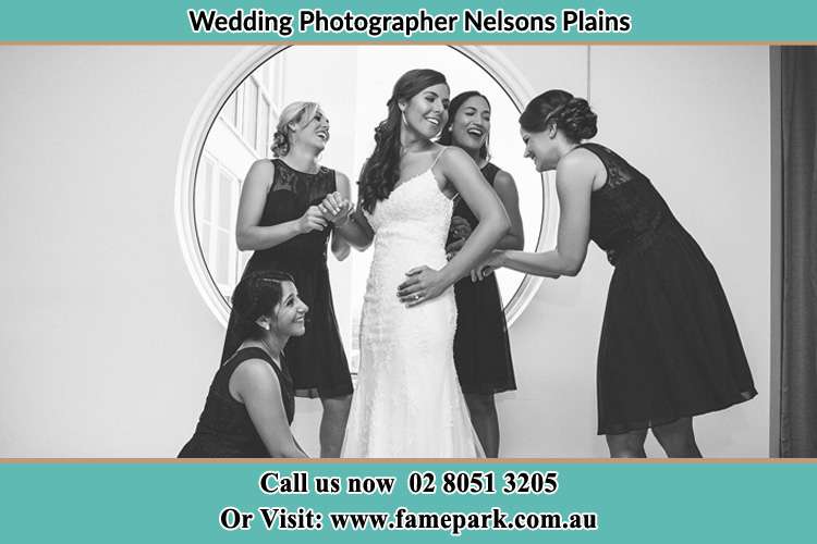 Photo of the Bride and the bridesmaids near the window Nelsons Plains NSW 2324