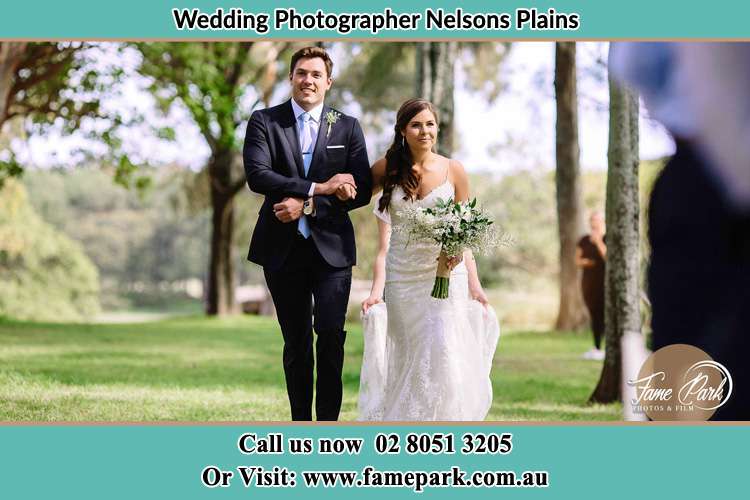 Photo of the Groom and the Bride walking Nelsons Plains NSW 2324